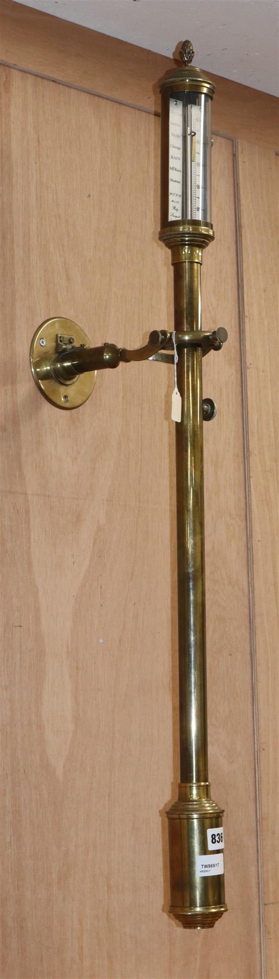 A modern brass ships barometer by Roby, Liverpool height 94cm